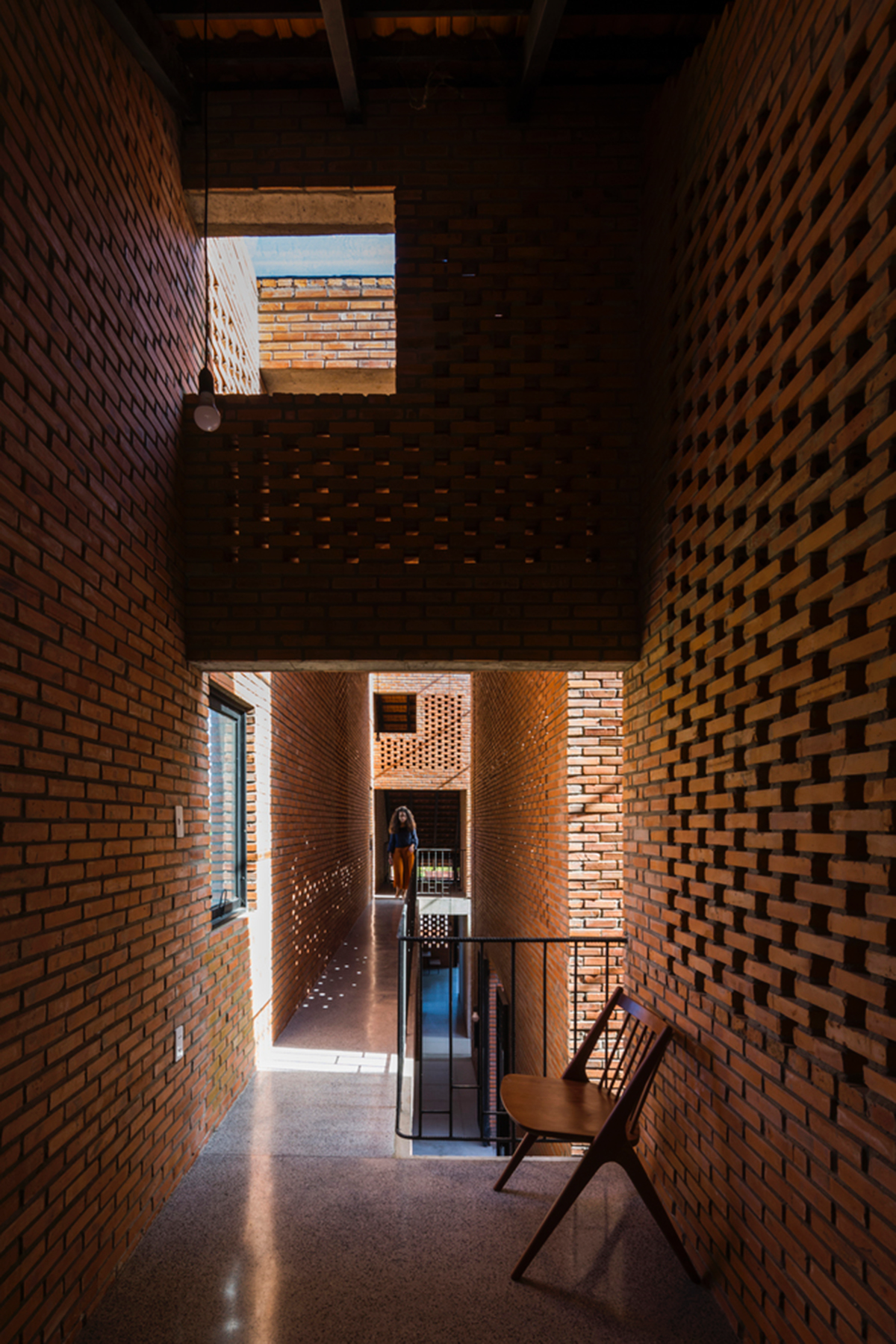 This Innovative Brick House In Vietnam Creates Continuous Internal Spaces
