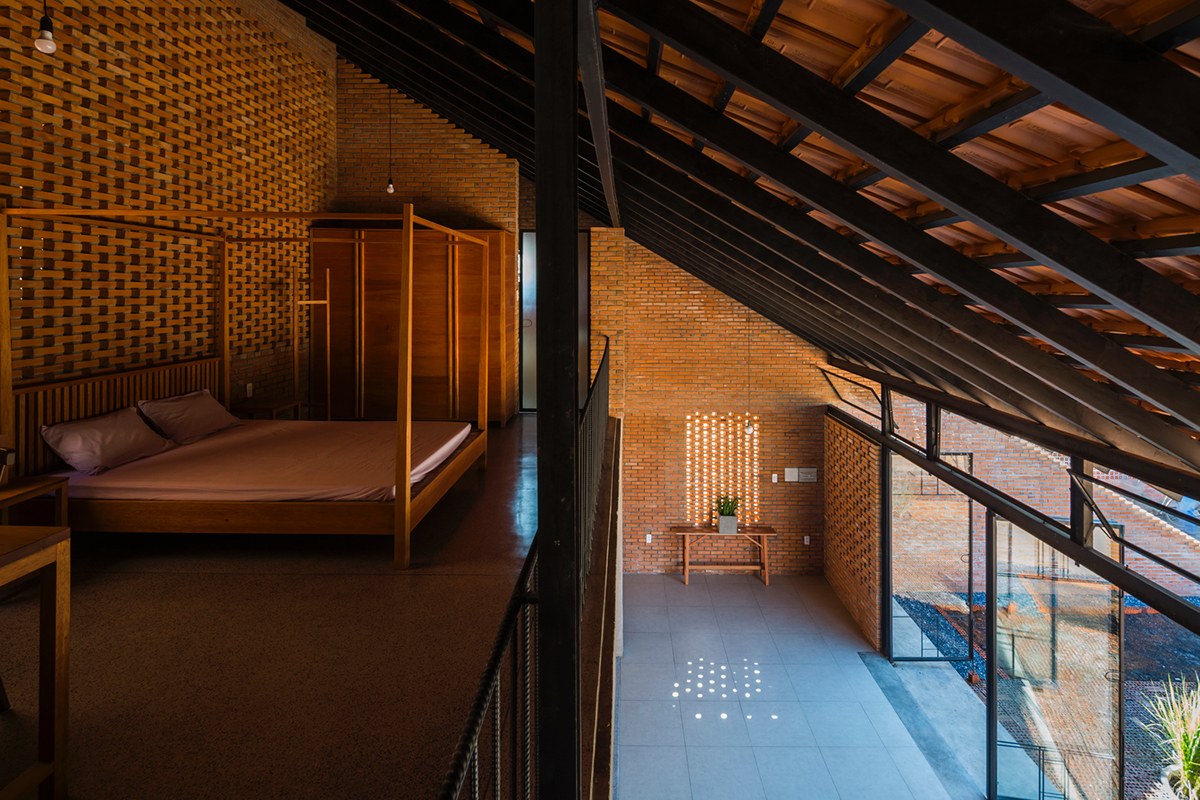 This Innovative Brick House In Vietnam Creates Continuous Internal Spaces