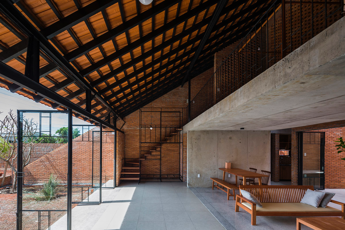 This Innovative Brick House In Vietnam Creates Continuous Internal Spaces