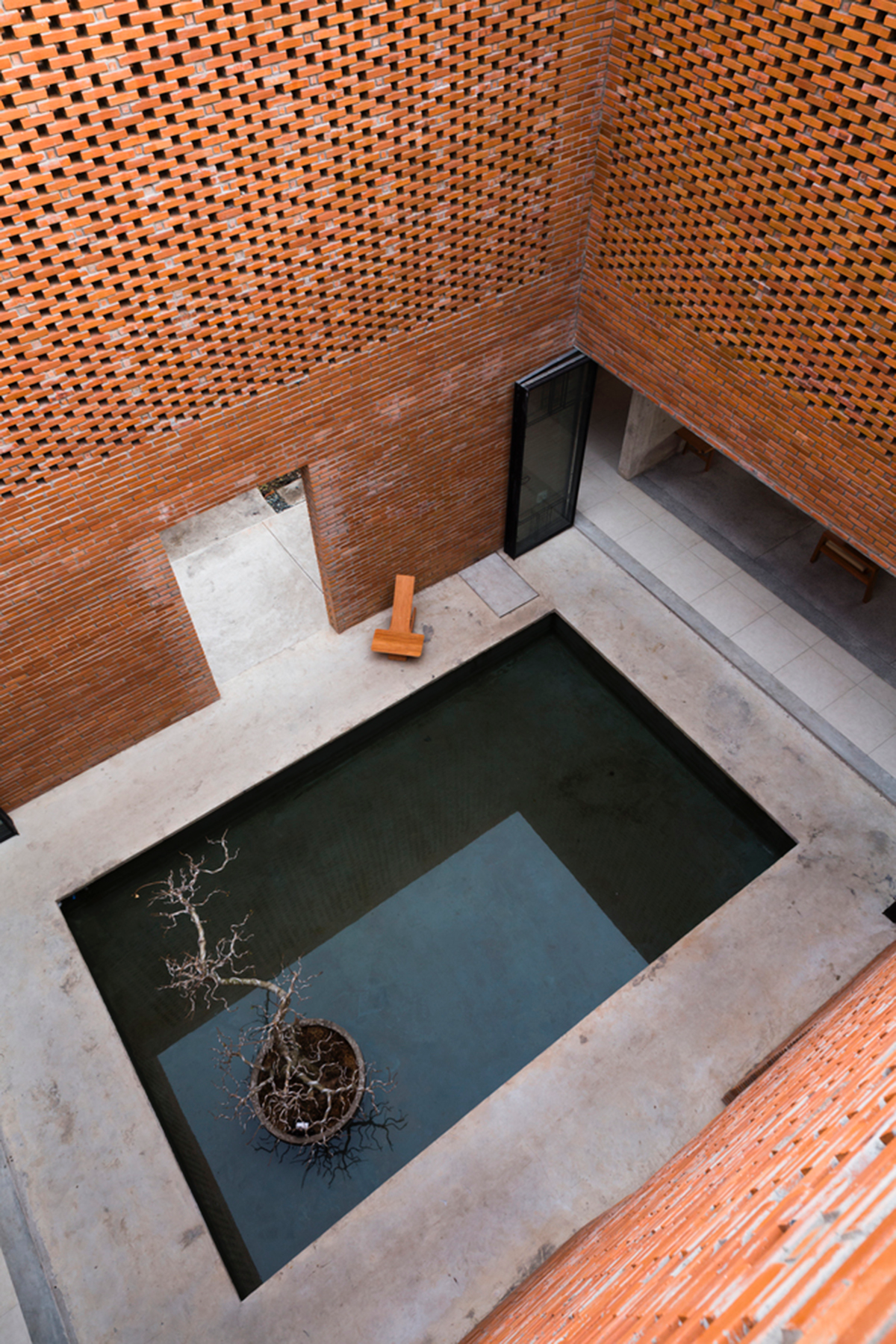 This Innovative Brick House In Vietnam Creates Continuous Internal Spaces