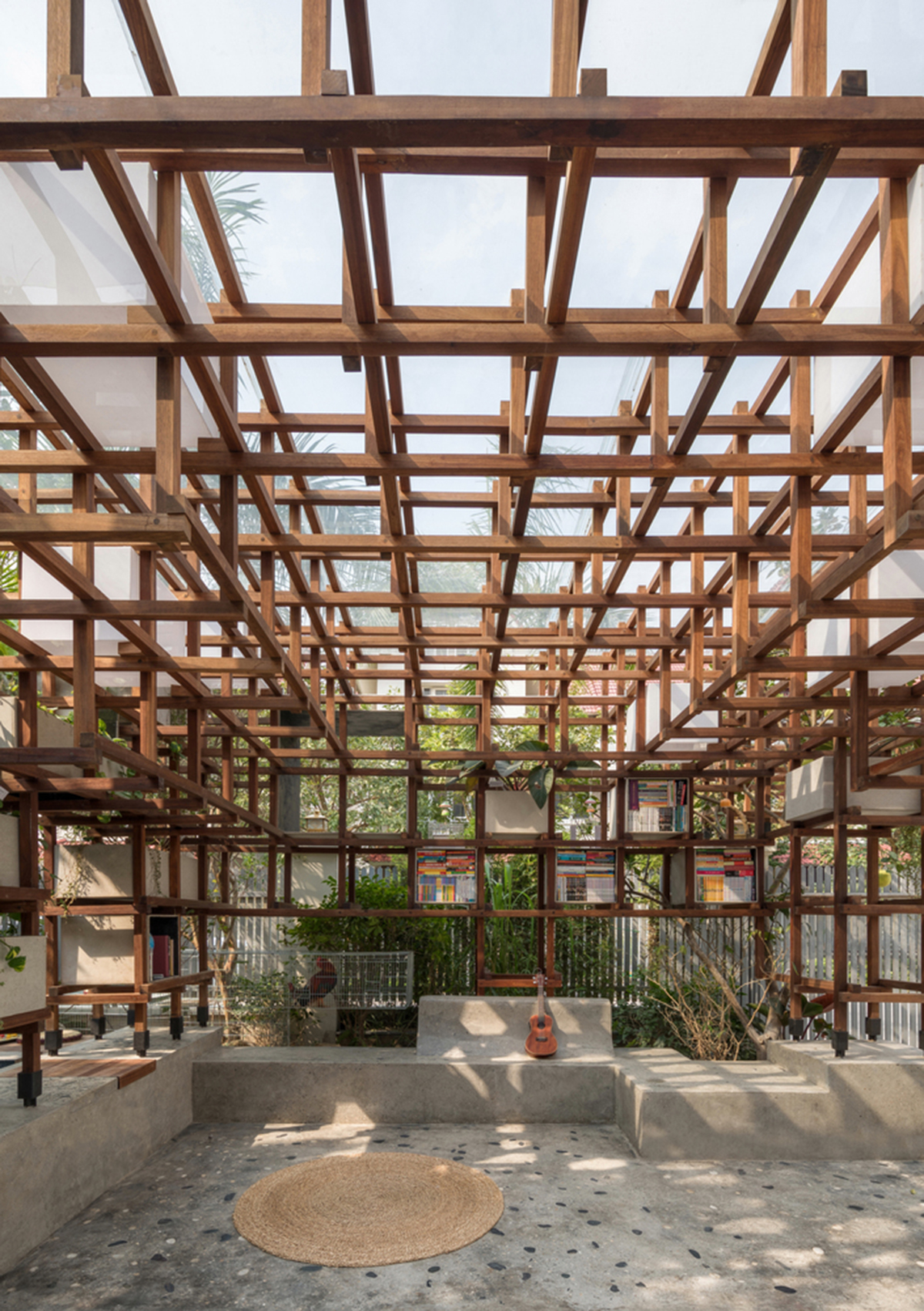 Farming Architects' Wooden Skeleton Provides Library Space For Children And Cage For Chickens