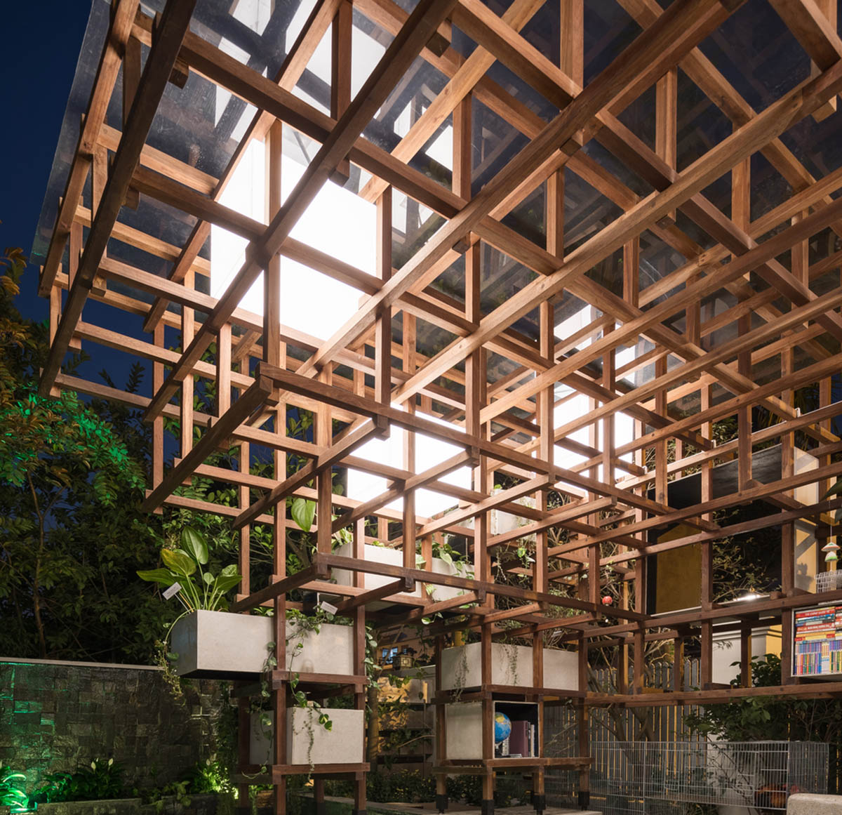 Farming Architects' Wooden Skeleton Provides Library Space For Children And Cage For Chickens