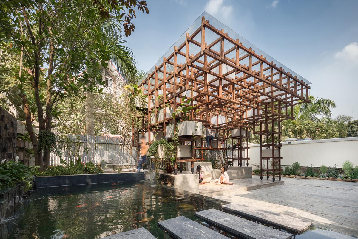 Farming Architects' Wooden Skeleton Provides Library Space For Children And Cage For Chickens