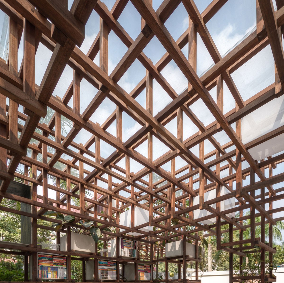 Farming Architects' Wooden Skeleton Provides Library Space For Children And Cage For Chickens