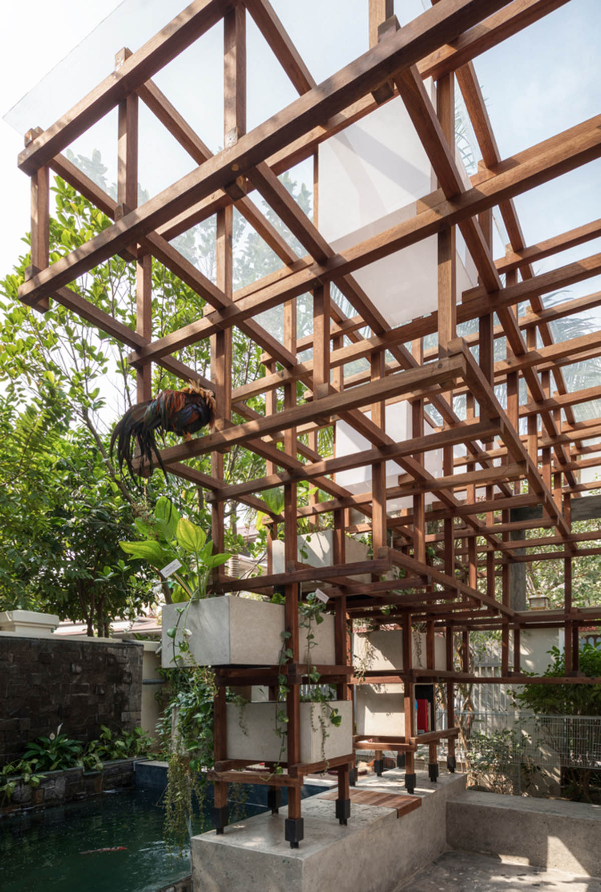 Farming Architects' Wooden Skeleton Provides Library Space For Children And Cage For Chickens