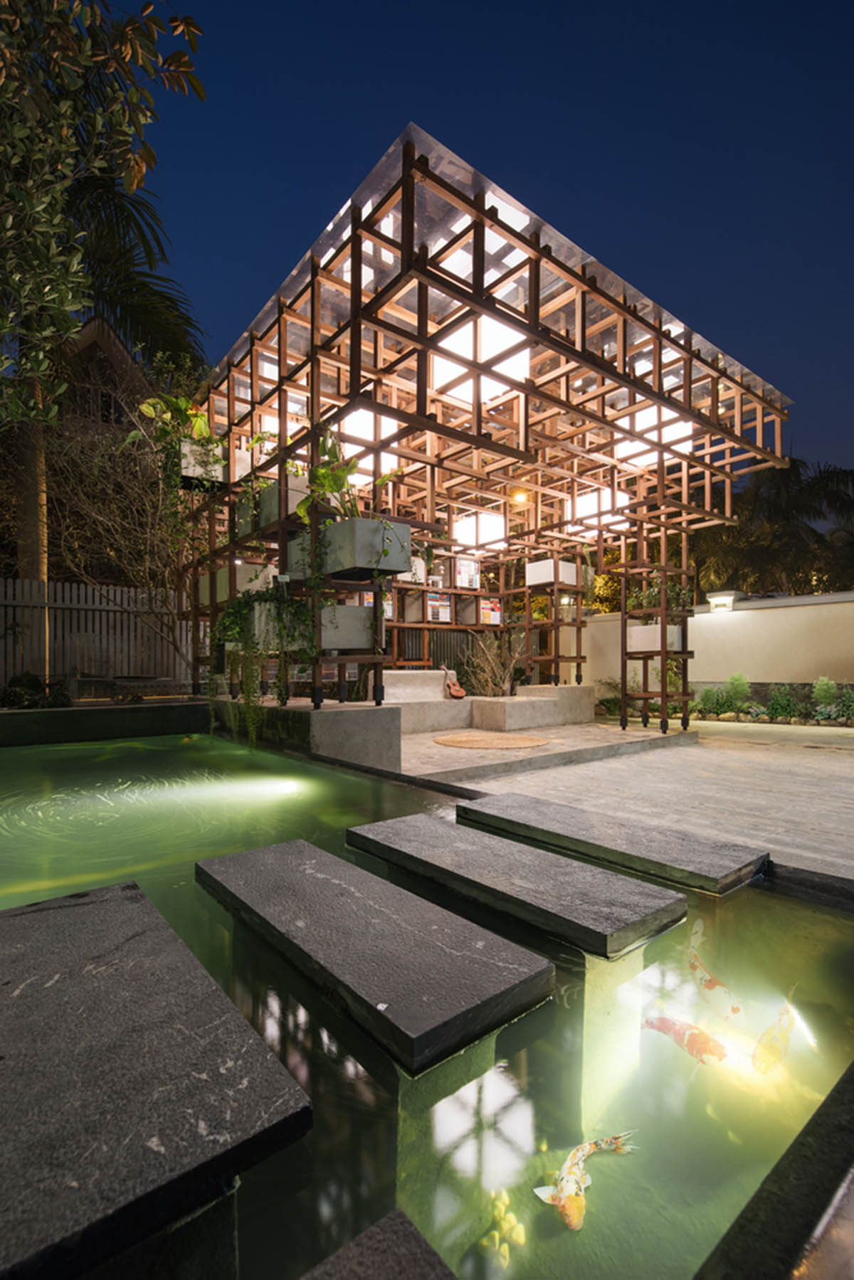 Farming Architects' Wooden Skeleton Provides Library Space For Children And Cage For Chickens