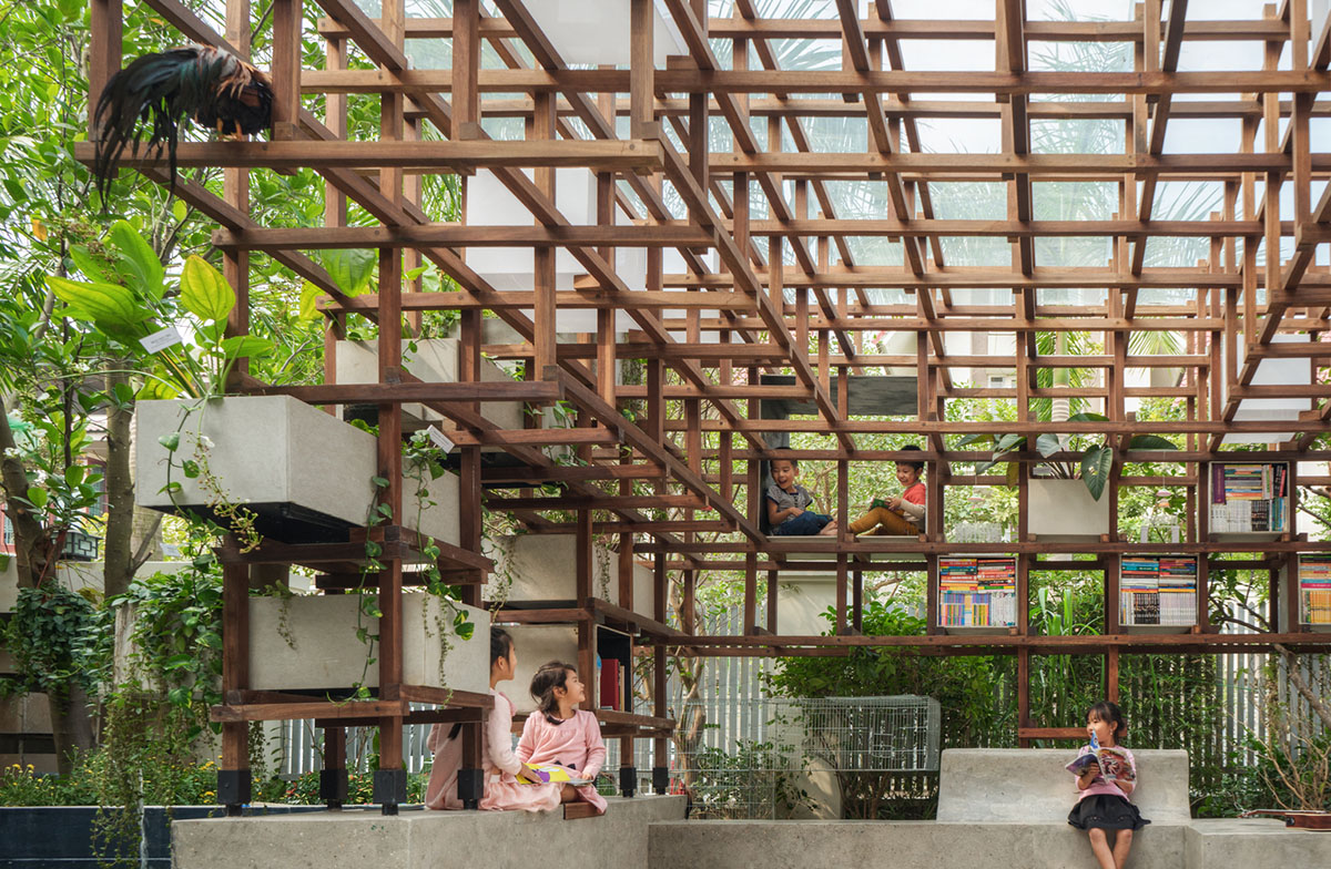 Farming Architects' Wooden Skeleton Provides Library Space For Children And Cage For Chickens