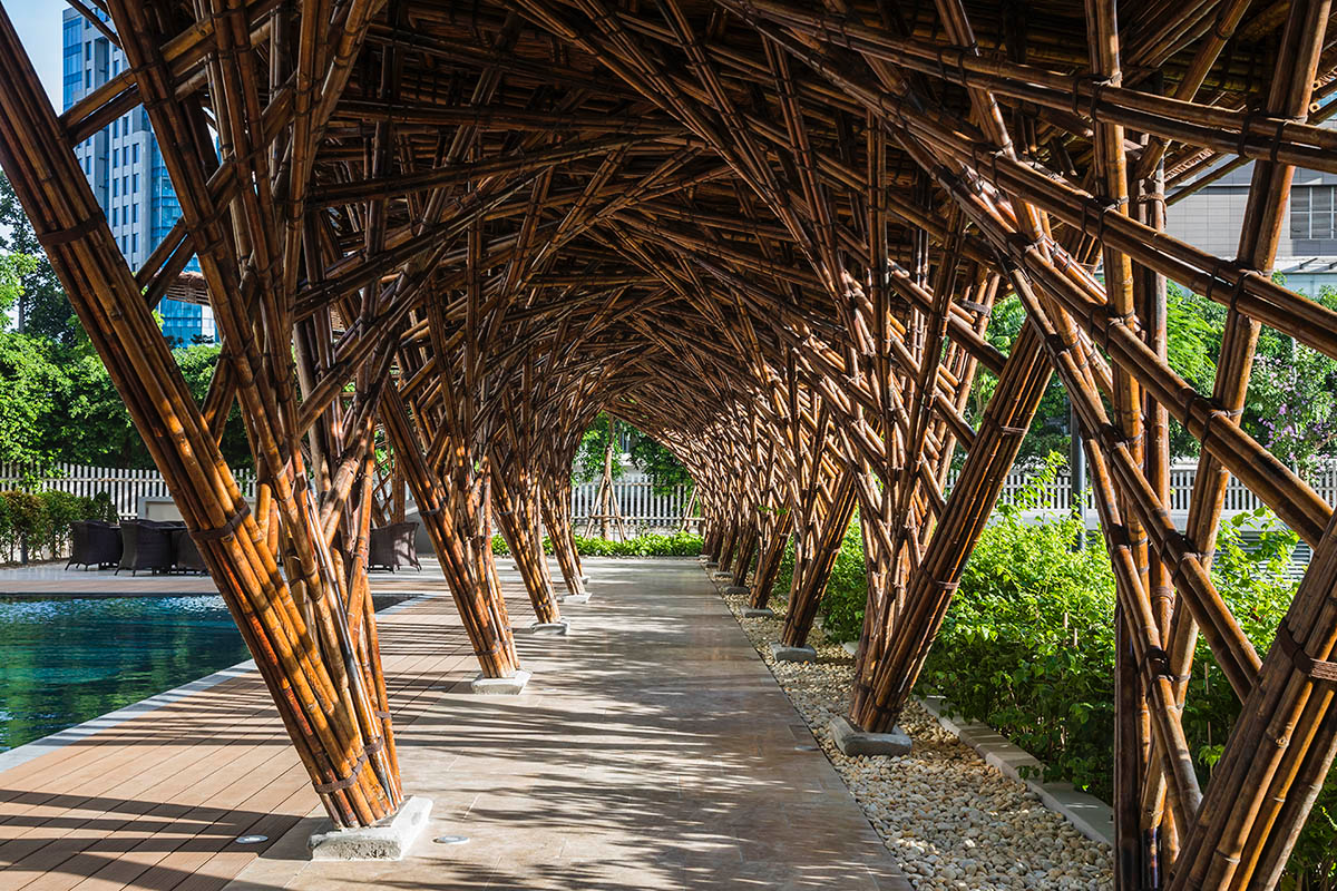 VTN Architects' Vinata Bamboo Pavilion creates a natural pathway in a garden of high-rise buildings