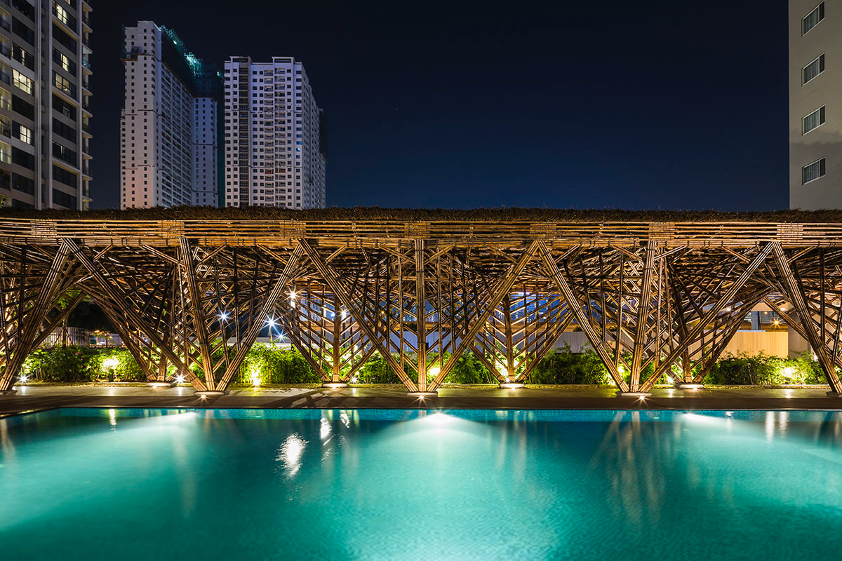 VTN Architects' Vinata Bamboo Pavilion creates a natural pathway in a garden of high-rise buildings