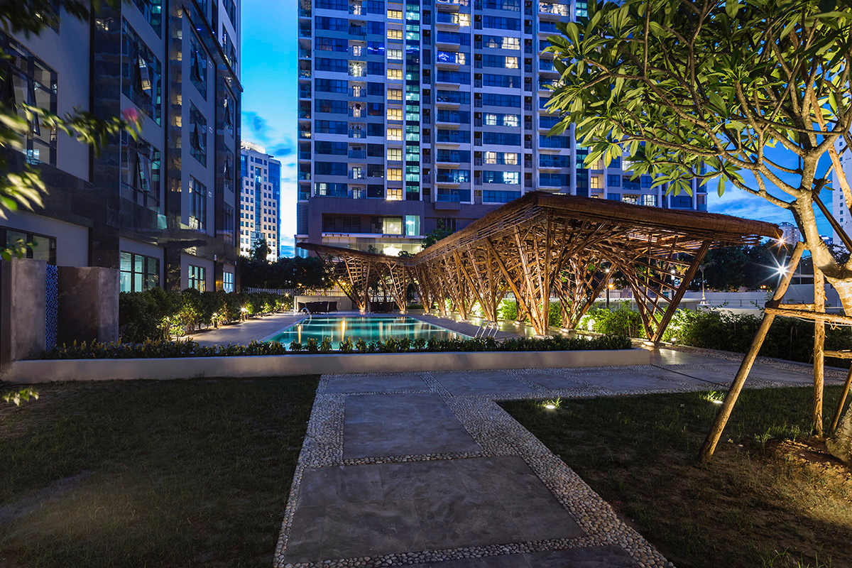 VTN Architects' Vinata Bamboo Pavilion creates a natural pathway in a garden of high-rise buildings