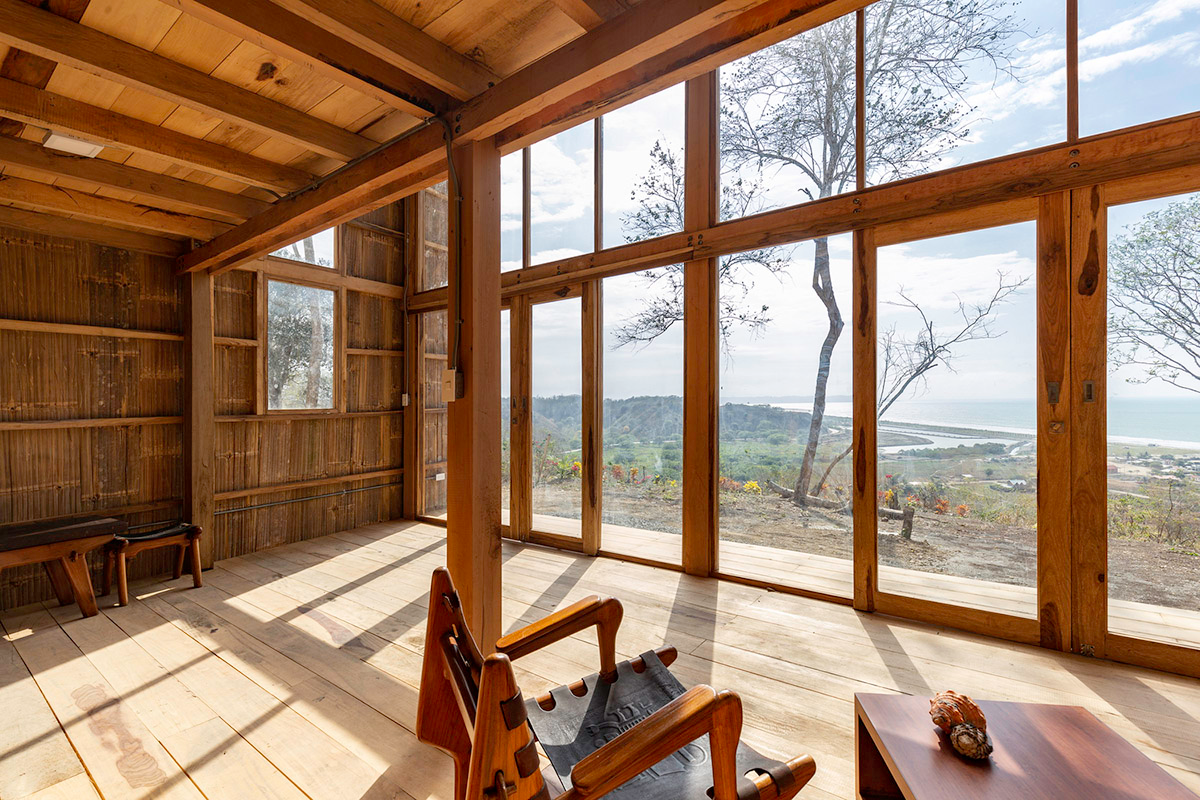 Emilio López Arquitecto's Casa Don Juan features double-opening facade to look at hills of Quito