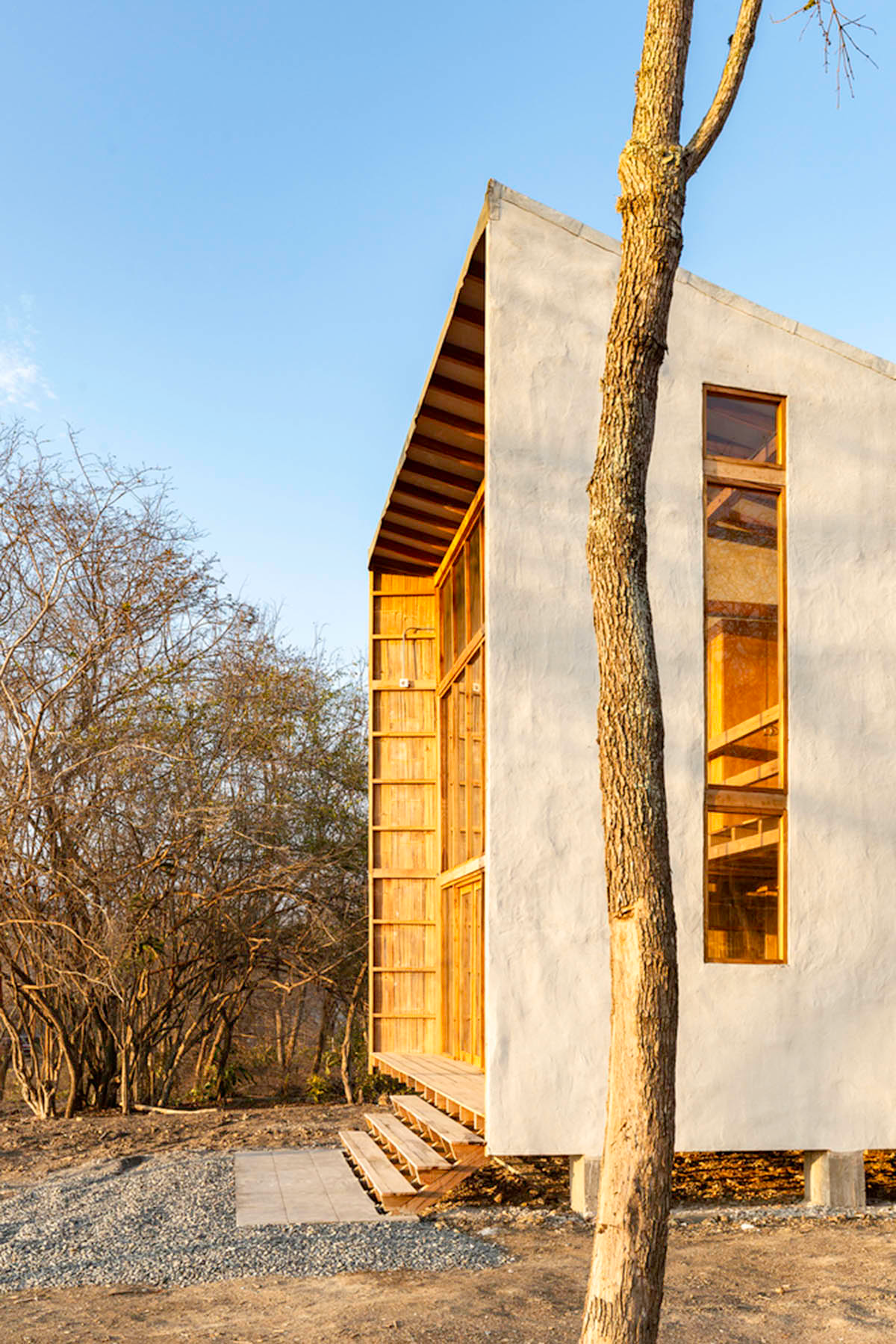 Emilio López Arquitecto's Casa Don Juan features double-opening facade to look at hills of Quito