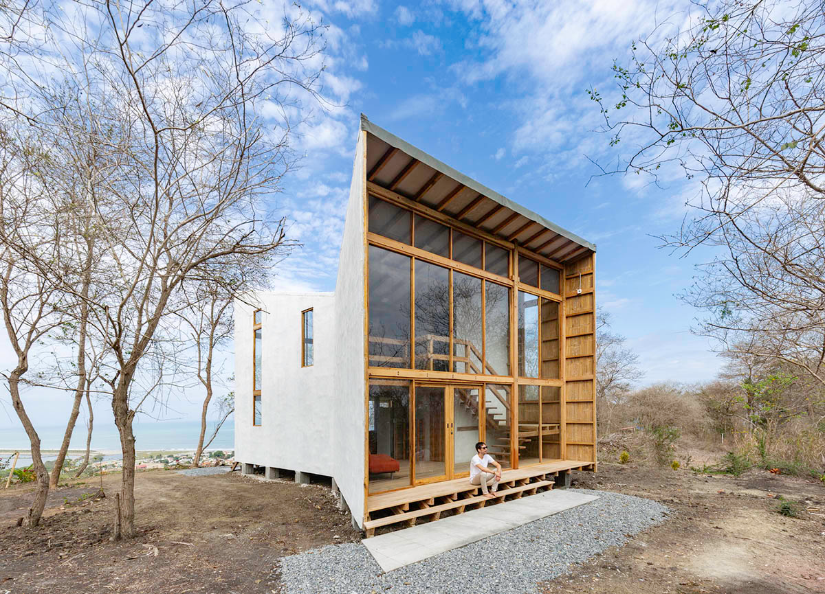 Emilio López Arquitecto's Casa Don Juan features double-opening facade to look at hills of Quito