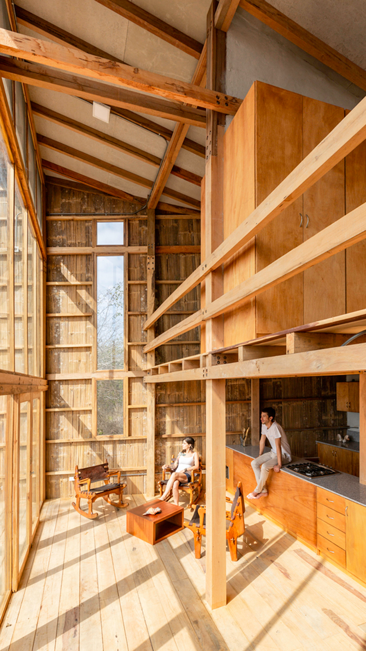 Emilio López Arquitecto's Casa Don Juan features double-opening facade to look at hills of Quito