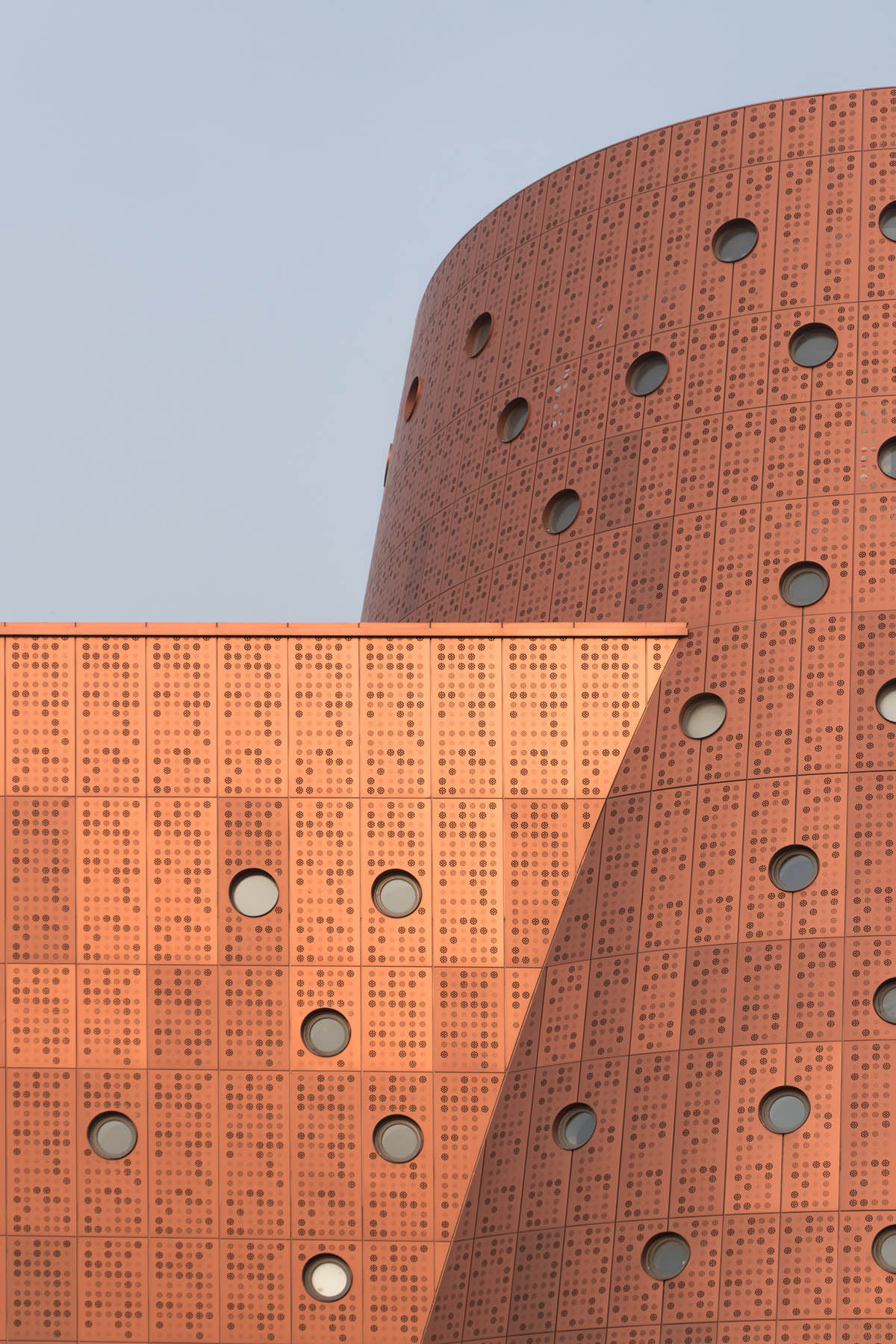 Bernard Tschumi's Exploratorium features copper-clad cones addressing Tianjin's industrial past