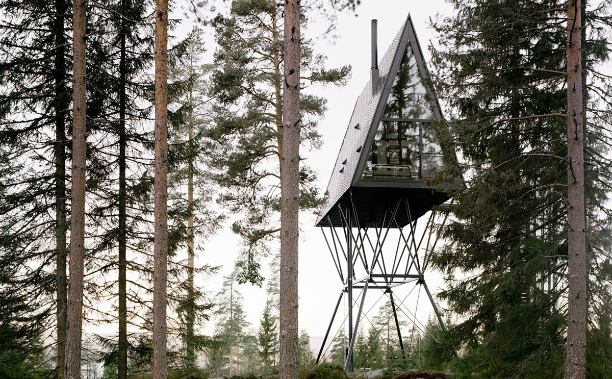 Espen Surnevik uses simple geometry for cabins raised on slim columns in forest area of Norway