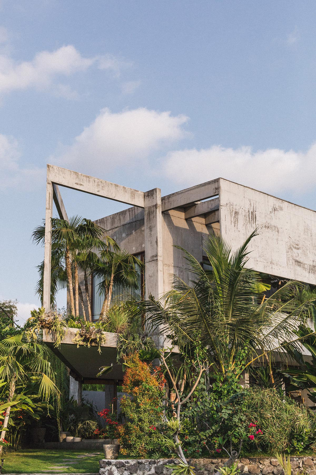 This Brutalist tropical house in Bali completely takes the nature inside