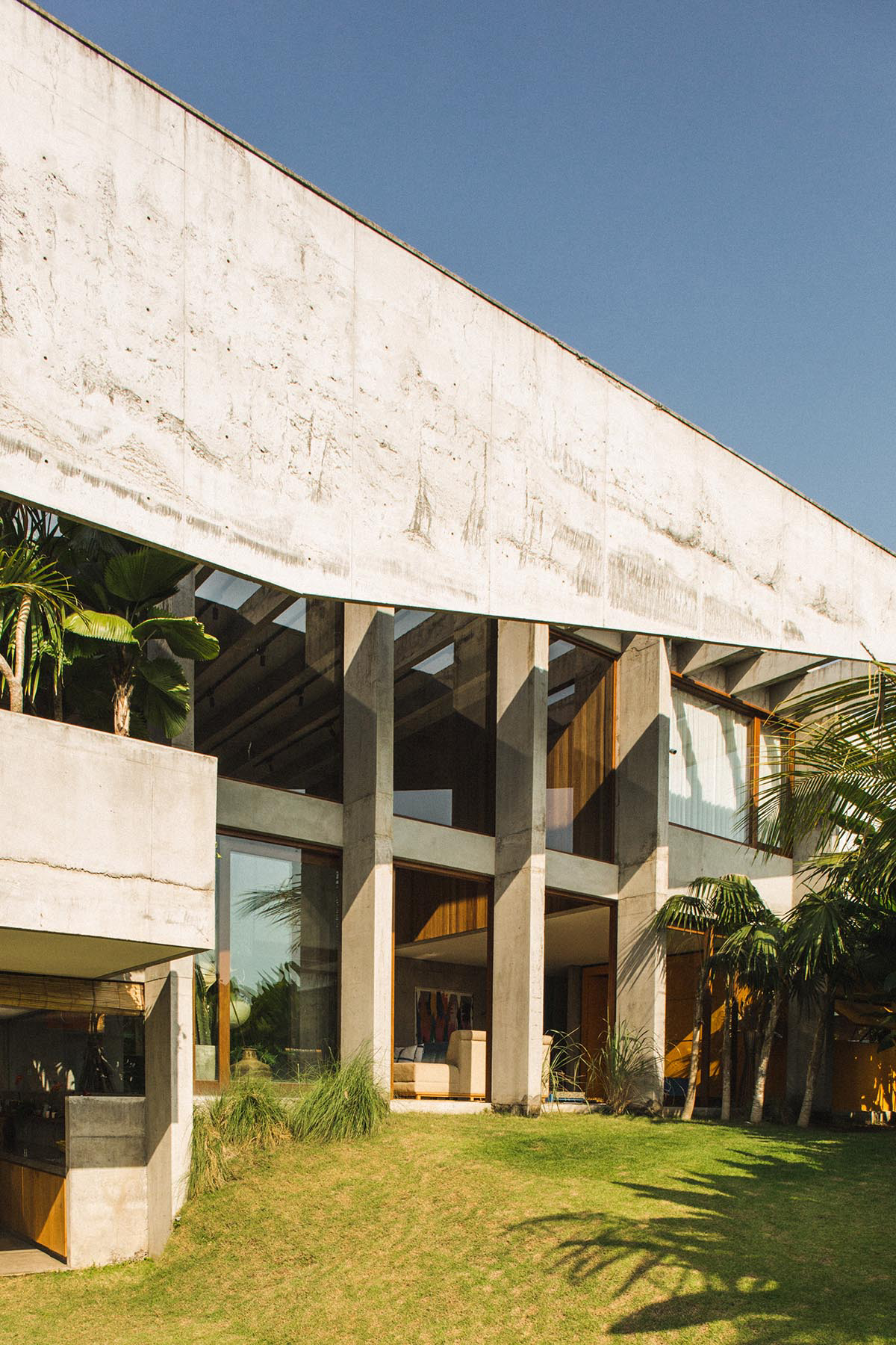 This Brutalist tropical house in Bali completely takes the nature inside