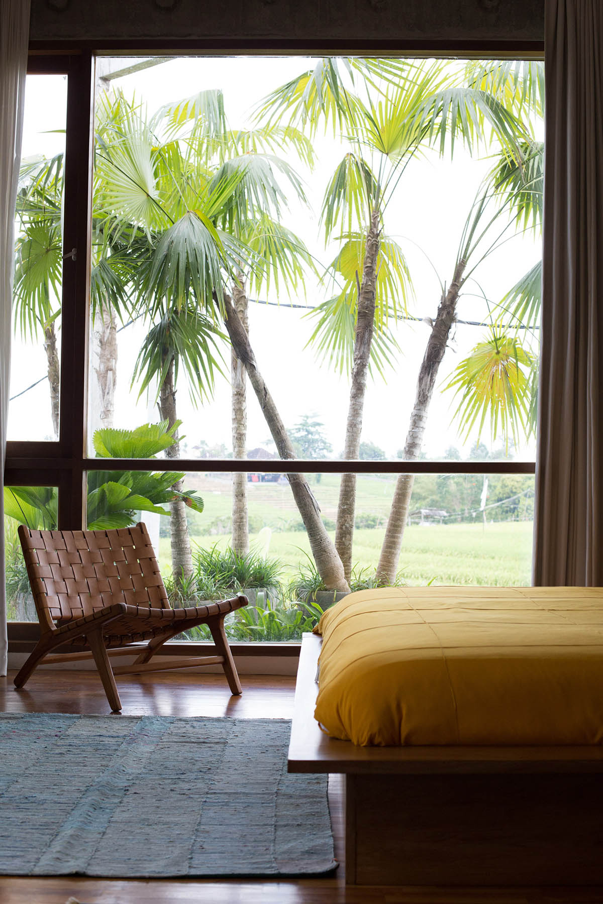 This Brutalist tropical house in Bali completely takes the nature inside