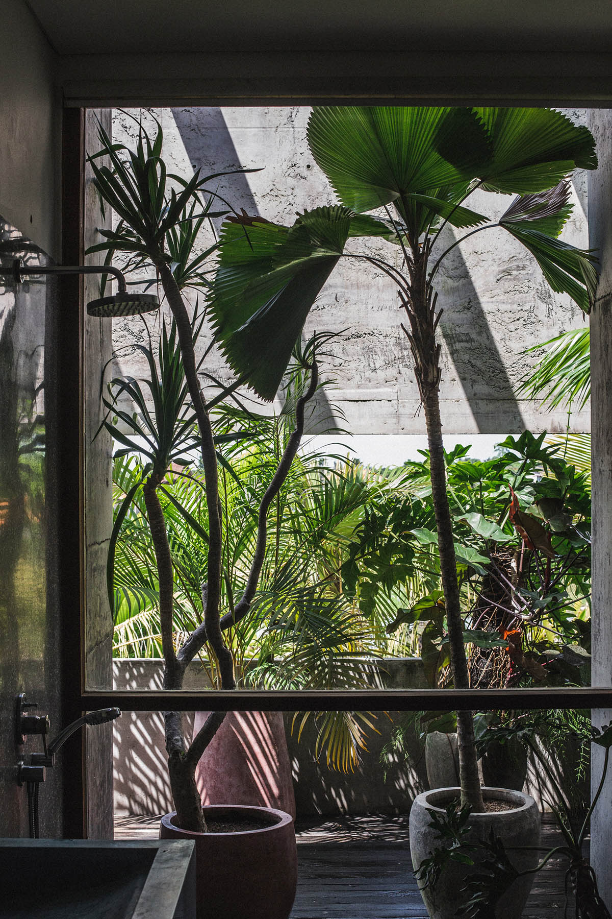 This Brutalist tropical house in Bali completely takes the nature inside
