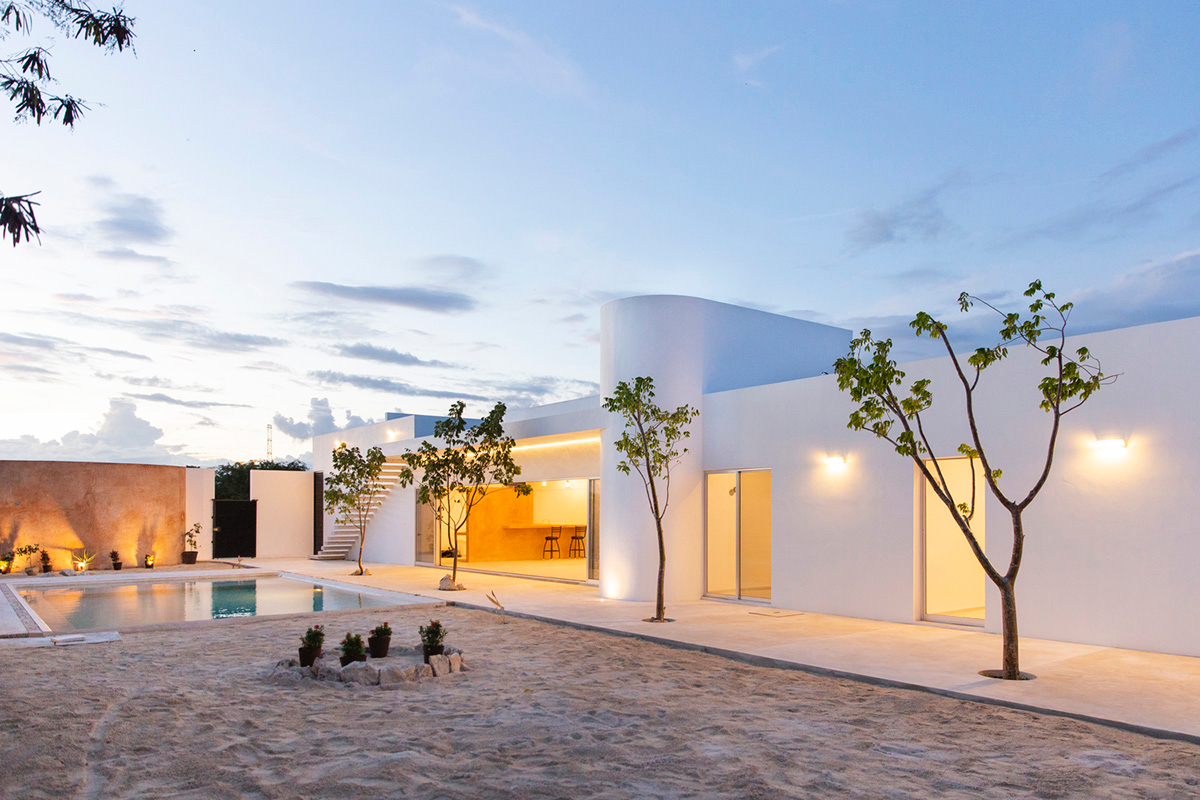 Garrido Lizarraga Arquitectos' white-coloured family house is enriched with cylindrical volumes
