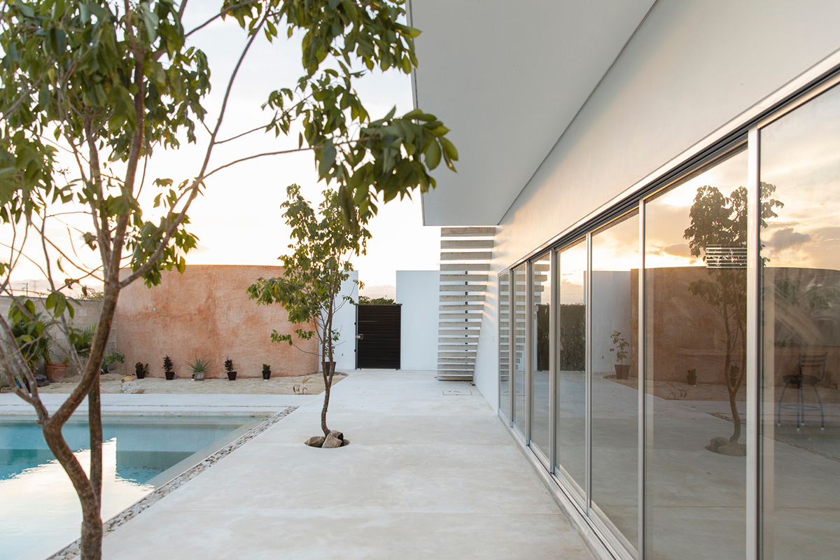Garrido Lizarraga Arquitectos' white-coloured family house is enriched with cylindrical volumes