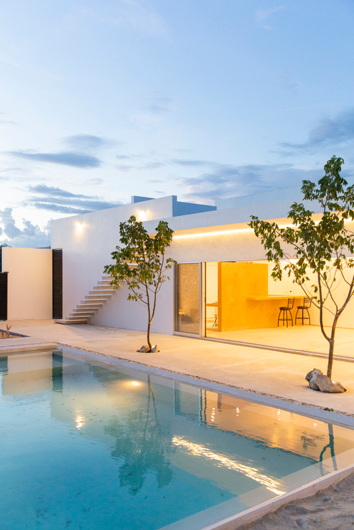 Garrido Lizarraga Arquitectos' white-coloured family house is enriched with cylindrical volumes