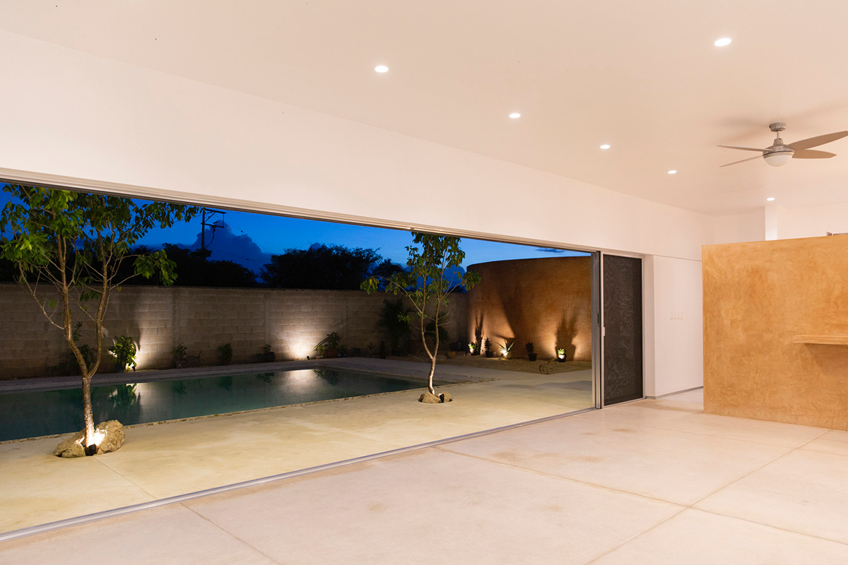 Garrido Lizarraga Arquitectos' white-coloured family house is enriched with cylindrical volumes