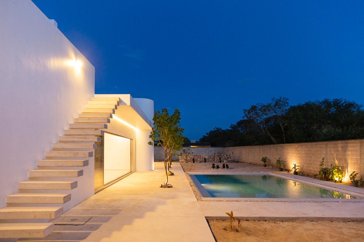 Garrido Lizarraga Arquitectos' white-coloured family house is enriched with cylindrical volumes