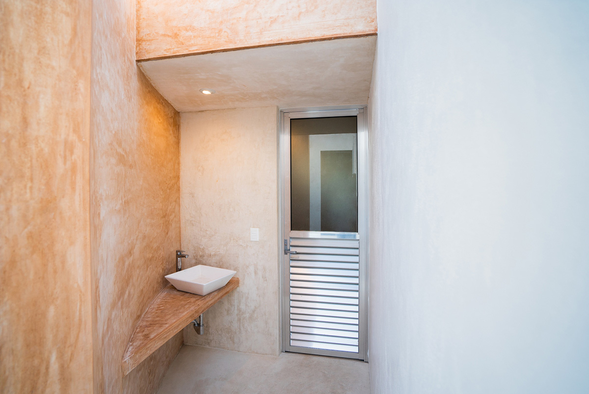 Garrido Lizarraga Arquitectos' white-coloured family house is enriched with cylindrical volumes