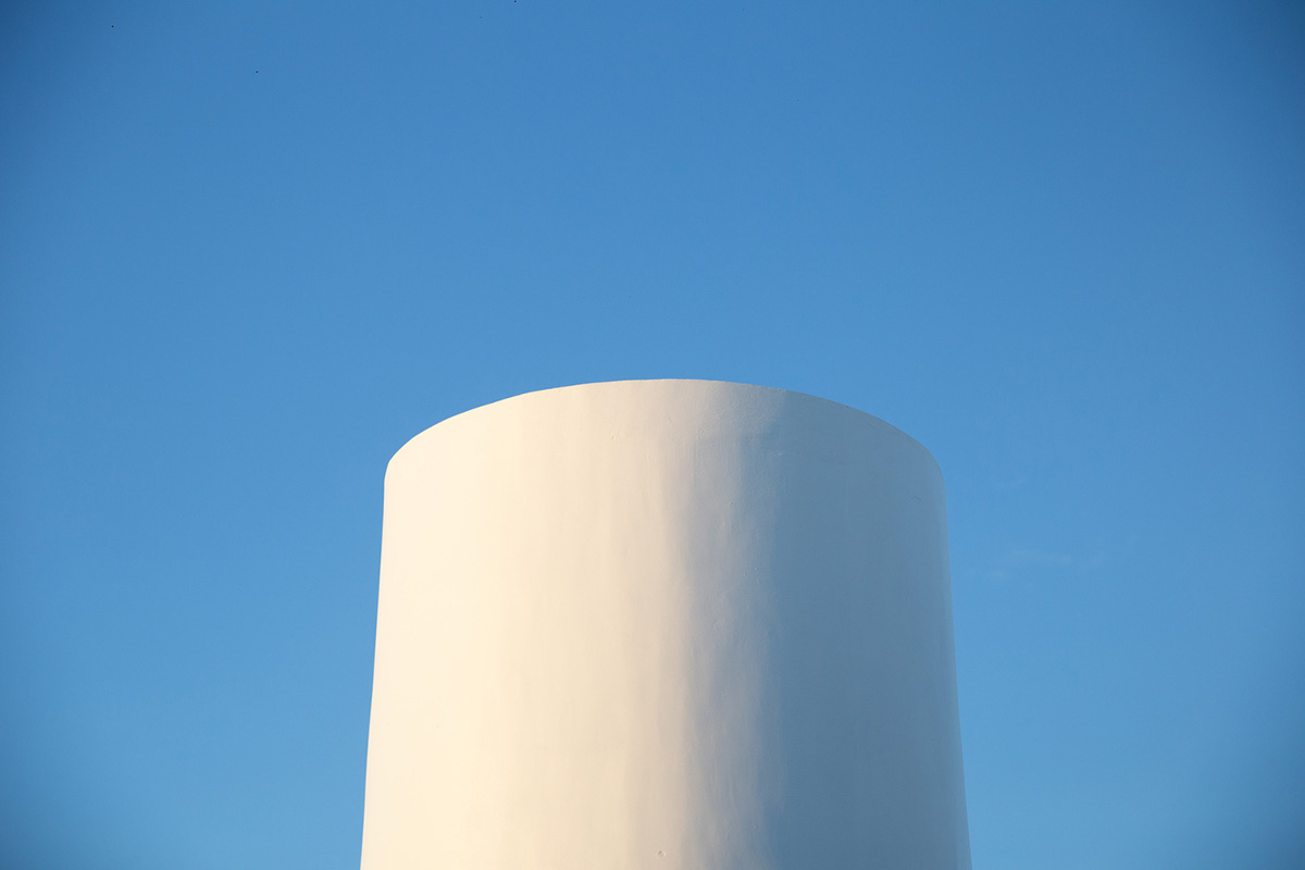 Garrido Lizarraga Arquitectos' white-coloured family house is enriched with cylindrical volumes