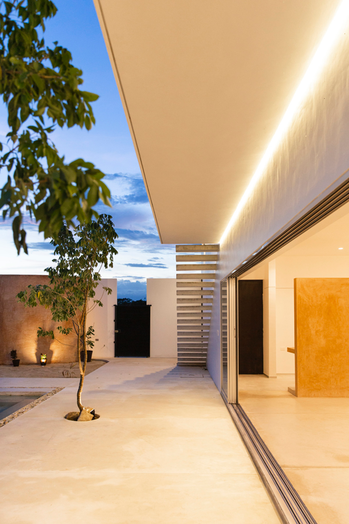 Garrido Lizarraga Arquitectos' white-coloured family house is enriched with cylindrical volumes