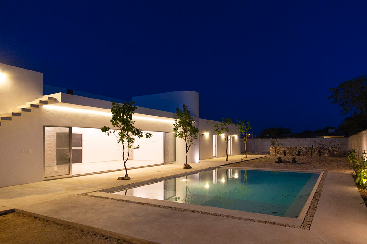 Garrido Lizarraga Arquitectos' white-coloured family house is enriched with cylindrical volumes