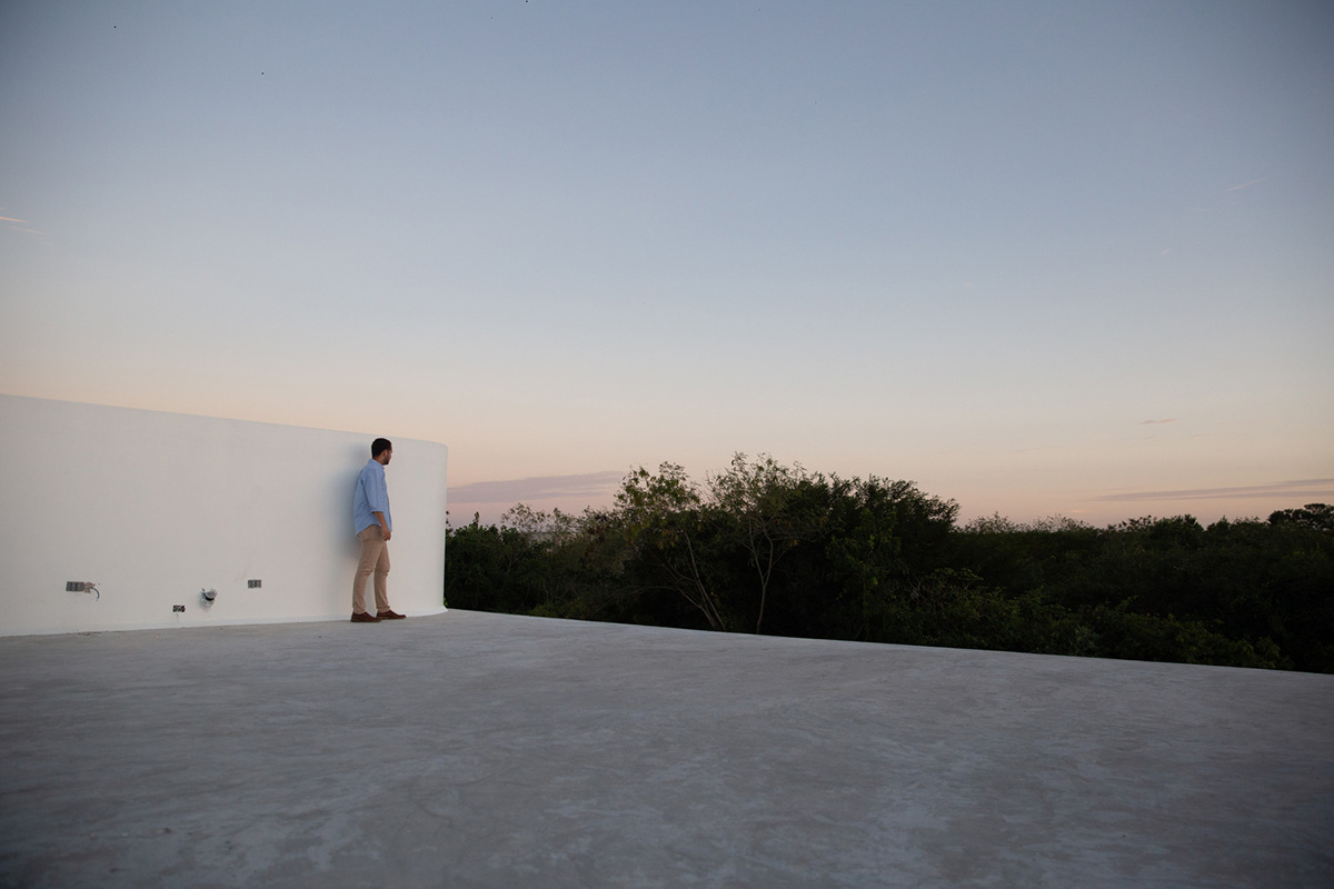 Garrido Lizarraga Arquitectos' white-coloured family house is enriched with cylindrical volumes