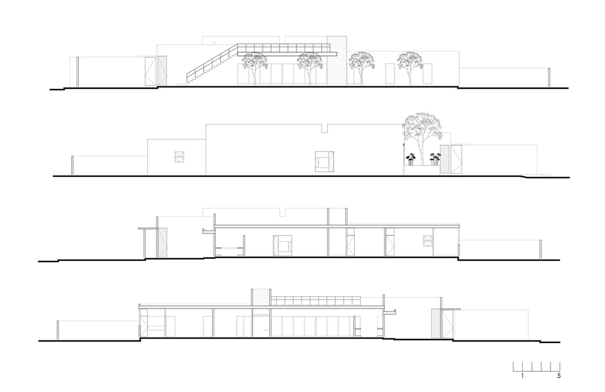 Garrido Lizarraga Arquitectos' white-coloured family house is enriched with cylindrical volumes