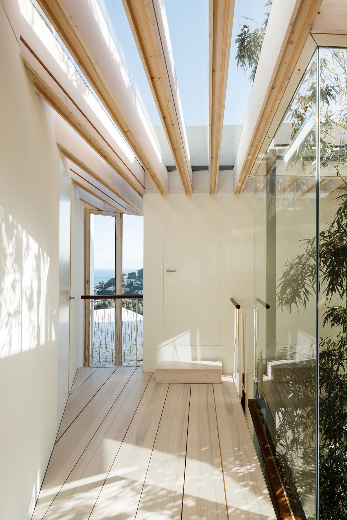 Caballero Colon Architects' house features protruding volumes giving different views to Canyamel Bay