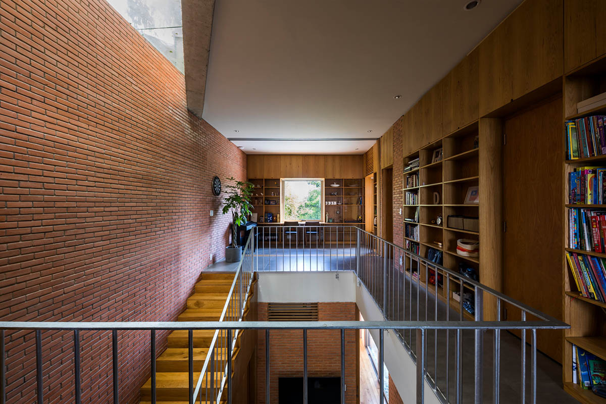 VTN Architects' new cascading family house creates large green gardens in a narrow site of Vietnam