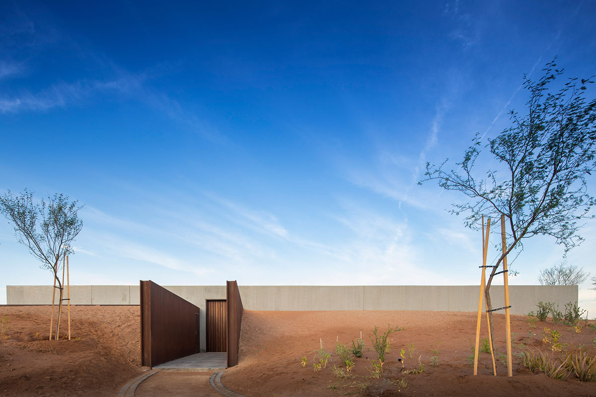 Anarchitect nestles this earth color hotel and spa building into the prehistoric of UAE