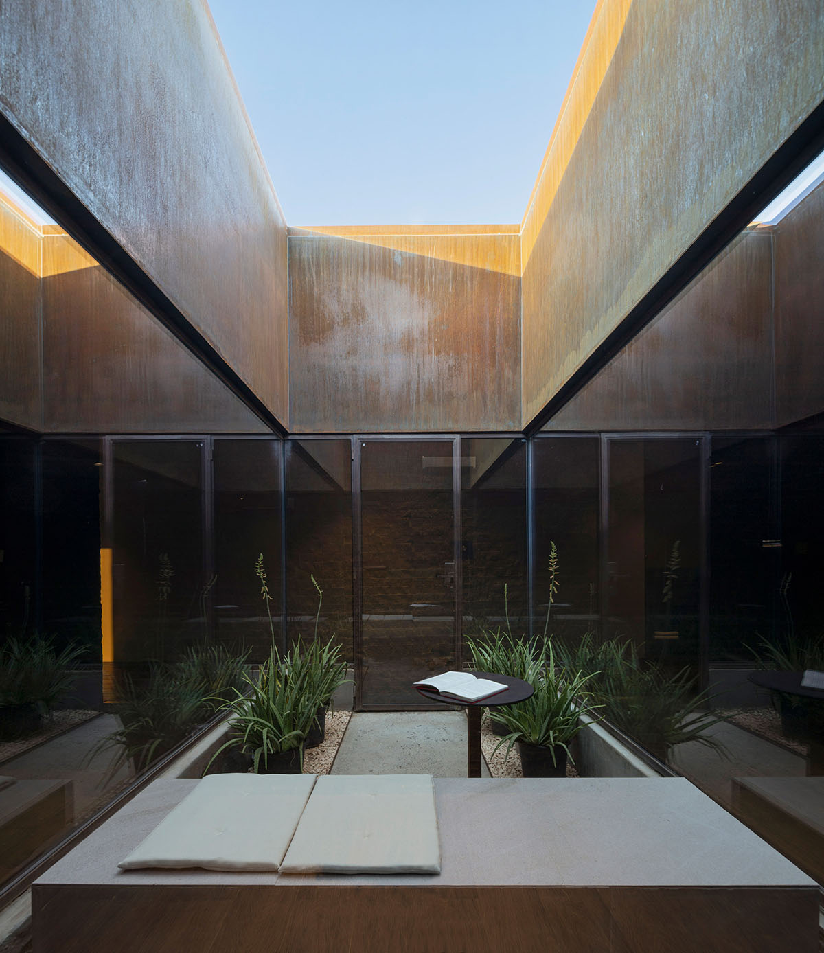 Anarchitect nestles this earth color hotel and spa building into the prehistoric of UAE