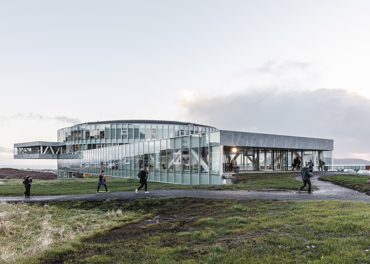 BIG's vortex-shaped education center combines three schools under one roof on the Faroe Islands