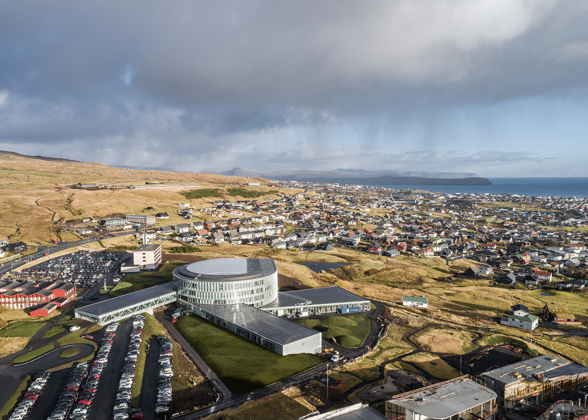 BIG's vortex-shaped education center combines three schools under one roof on the Faroe Islands