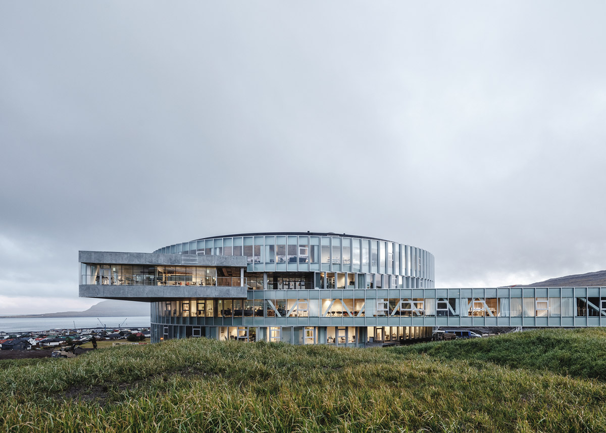 BIG's vortex-shaped education center combines three schools under one roof on the Faroe Islands