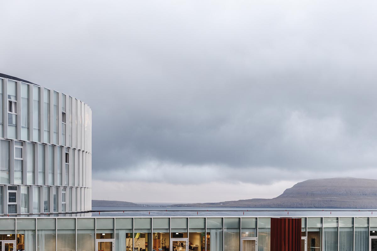BIG's vortex-shaped education center combines three schools under one roof on the Faroe Islands