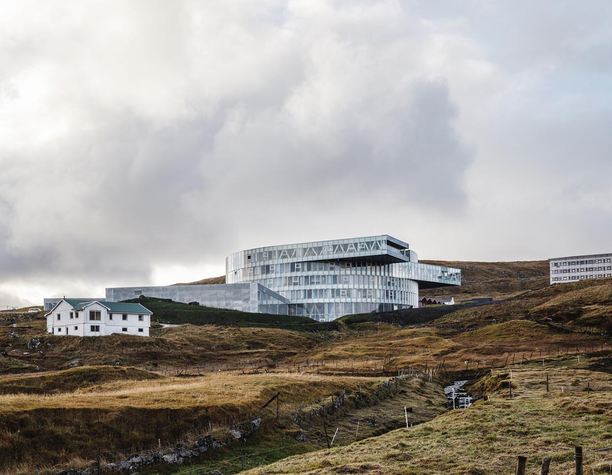 BIG's vortex-shaped education center combines three schools under one roof on the Faroe Islands