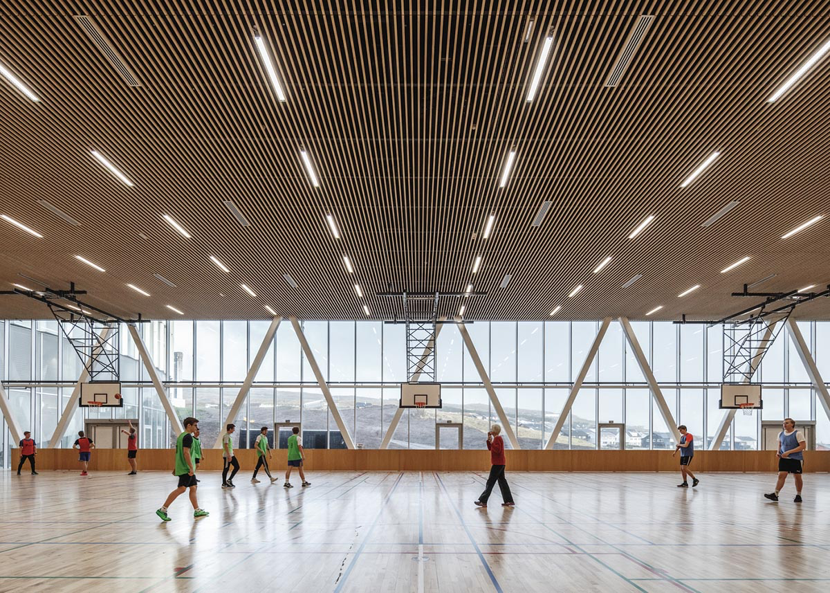 BIG's vortex-shaped education center combines three schools under one roof on the Faroe Islands