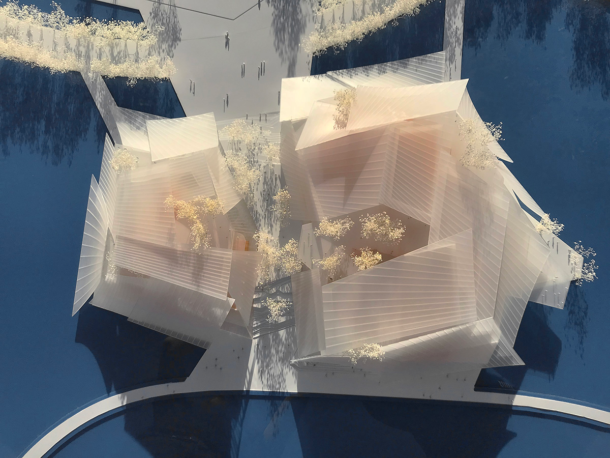 MAD's grand theater made of layers of glass sails moves forward in Yiwu, China