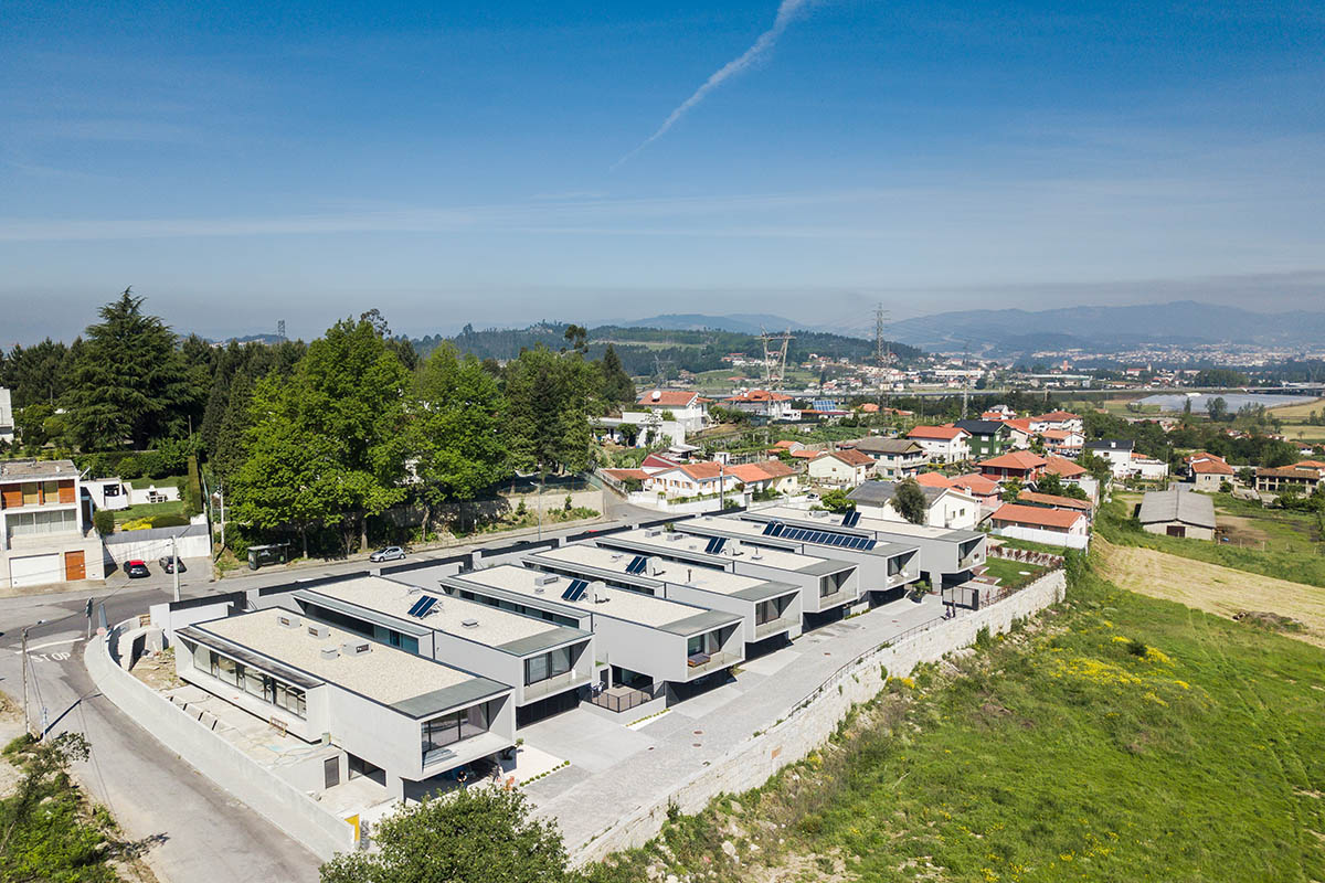 Grupo Zegnea's linear Portuguese houses create fluidity of space with large openings towards nature