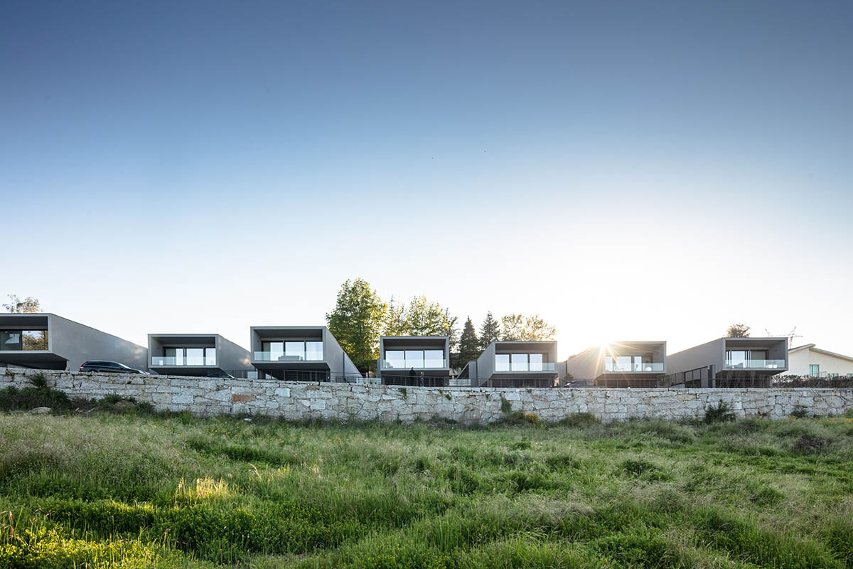 Grupo Zegnea's linear Portuguese houses create fluidity of space with large openings towards nature