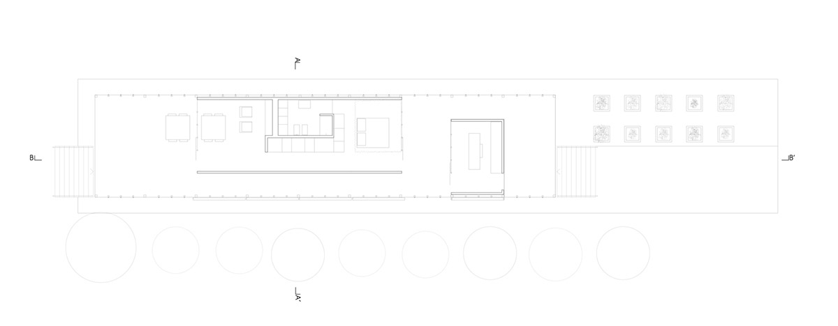 LDA.iMdA architetti associati built modular house raised on stilts in the middle of orchard in Italy