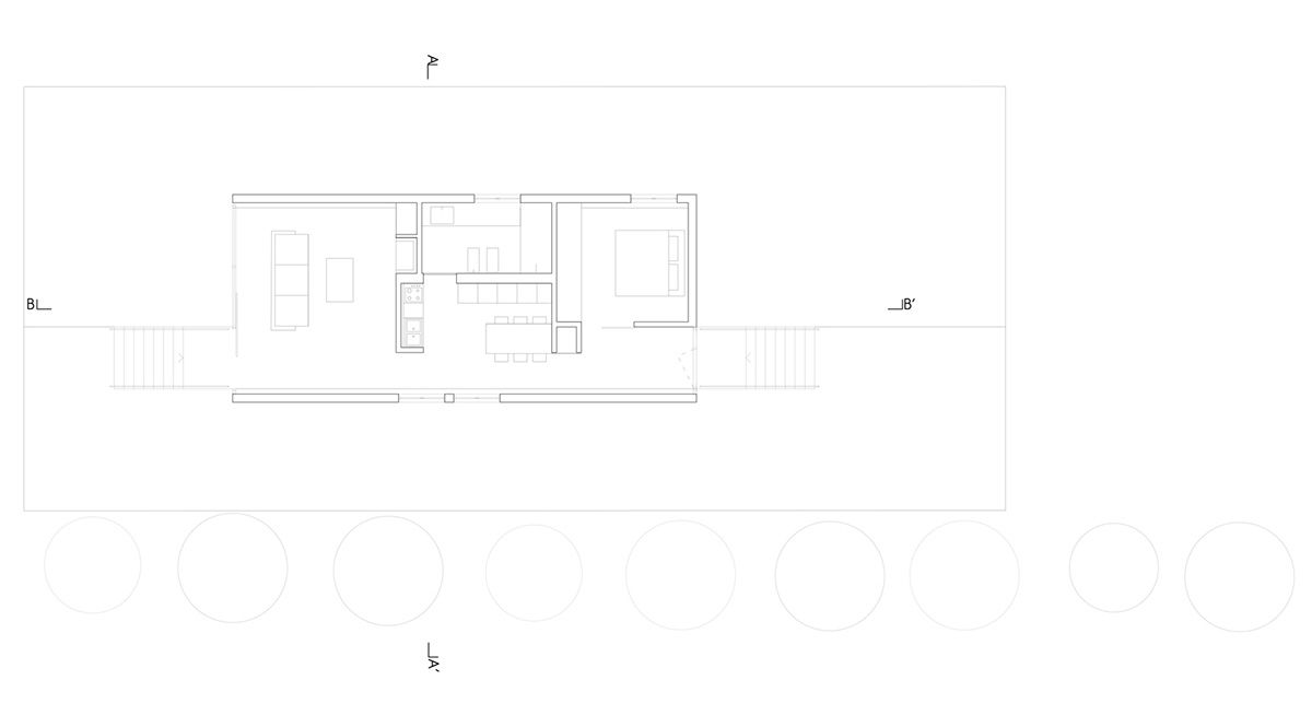LDA.iMdA architetti associati built modular house raised on stilts in the middle of orchard in Italy